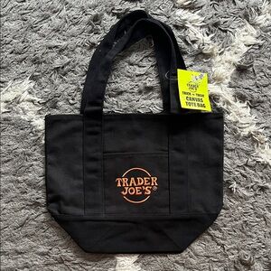 Trader Joe’s mini canvas tote. Halloween drop. Black w/ orange. New with tags.